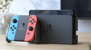 17452025473306-nintendoswitchmodellooledrossoneonbluneonschermo7pollici